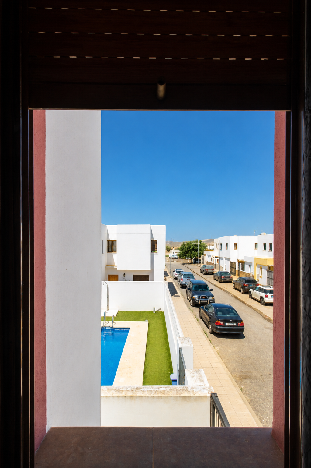 Casa con piscina comunitaria