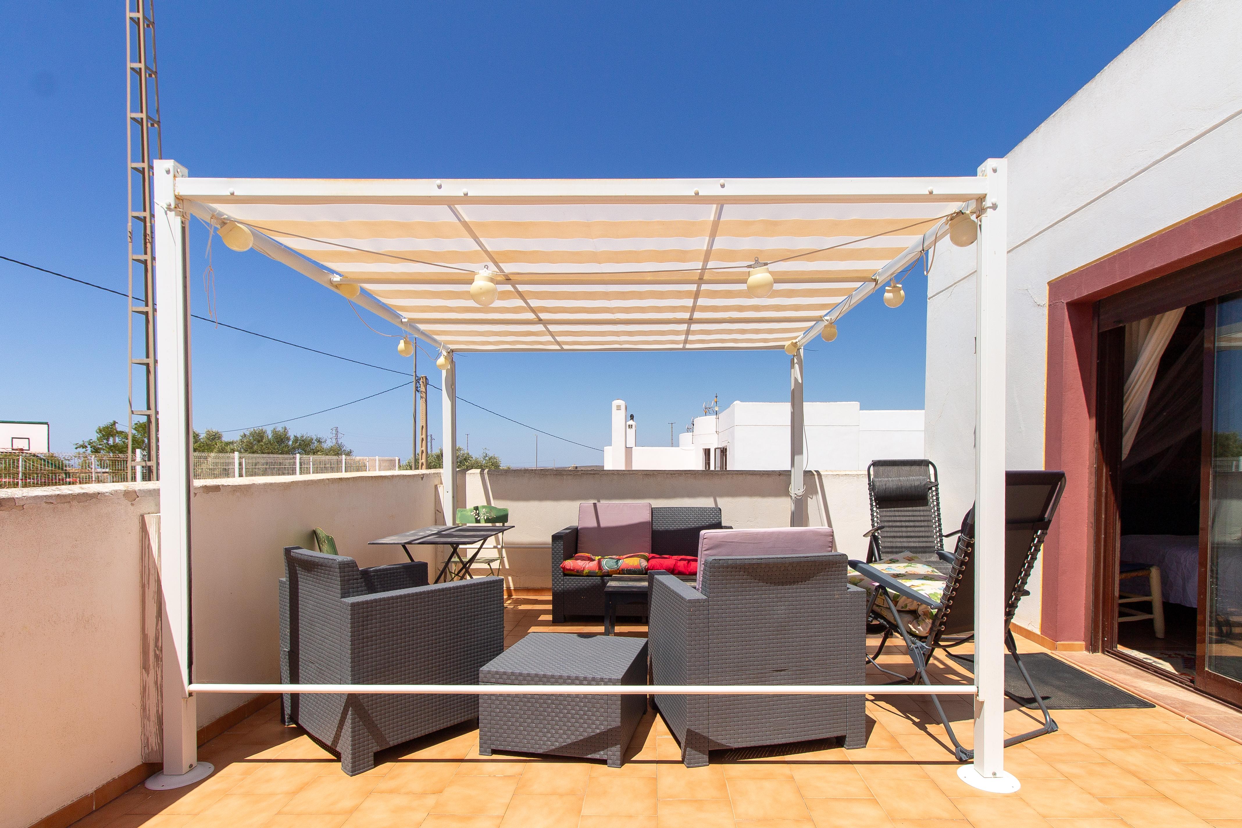 Casa con piscina comunitaria