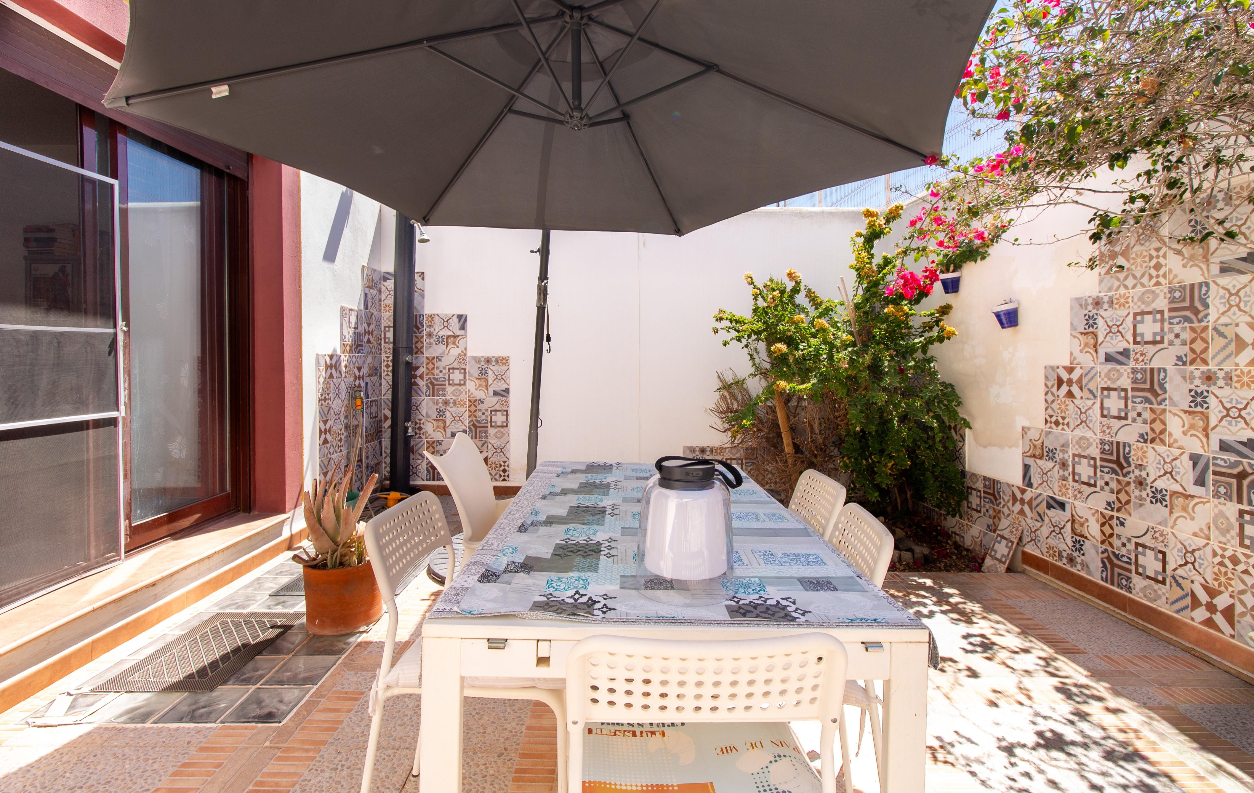 Casa con piscina comunitaria