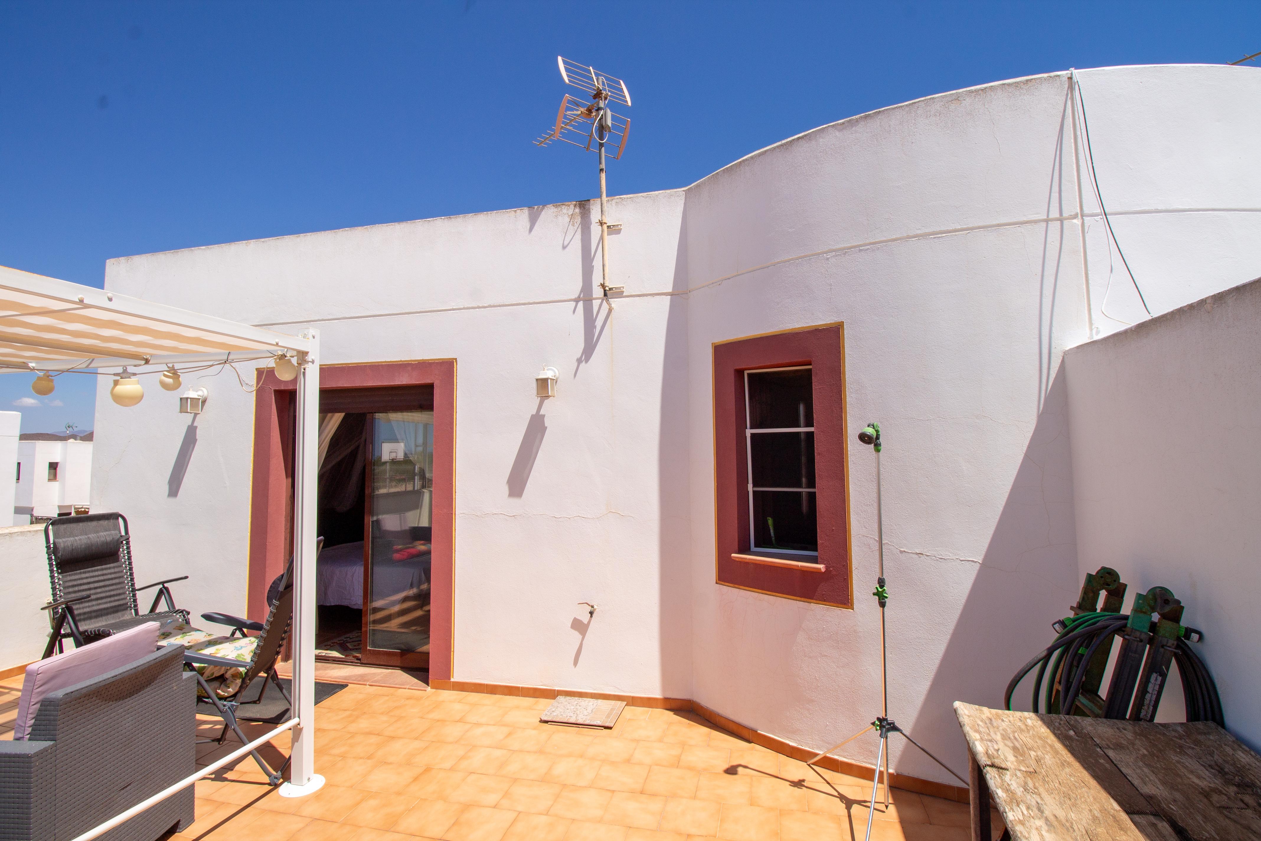 Casa con piscina comunitaria